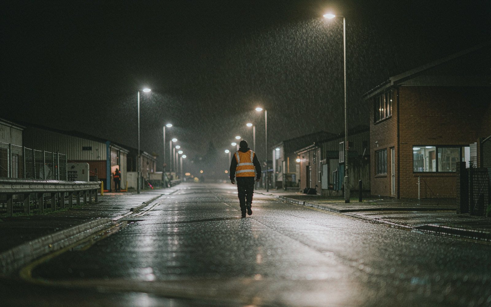 Night patrol along a service road on an industrial estate