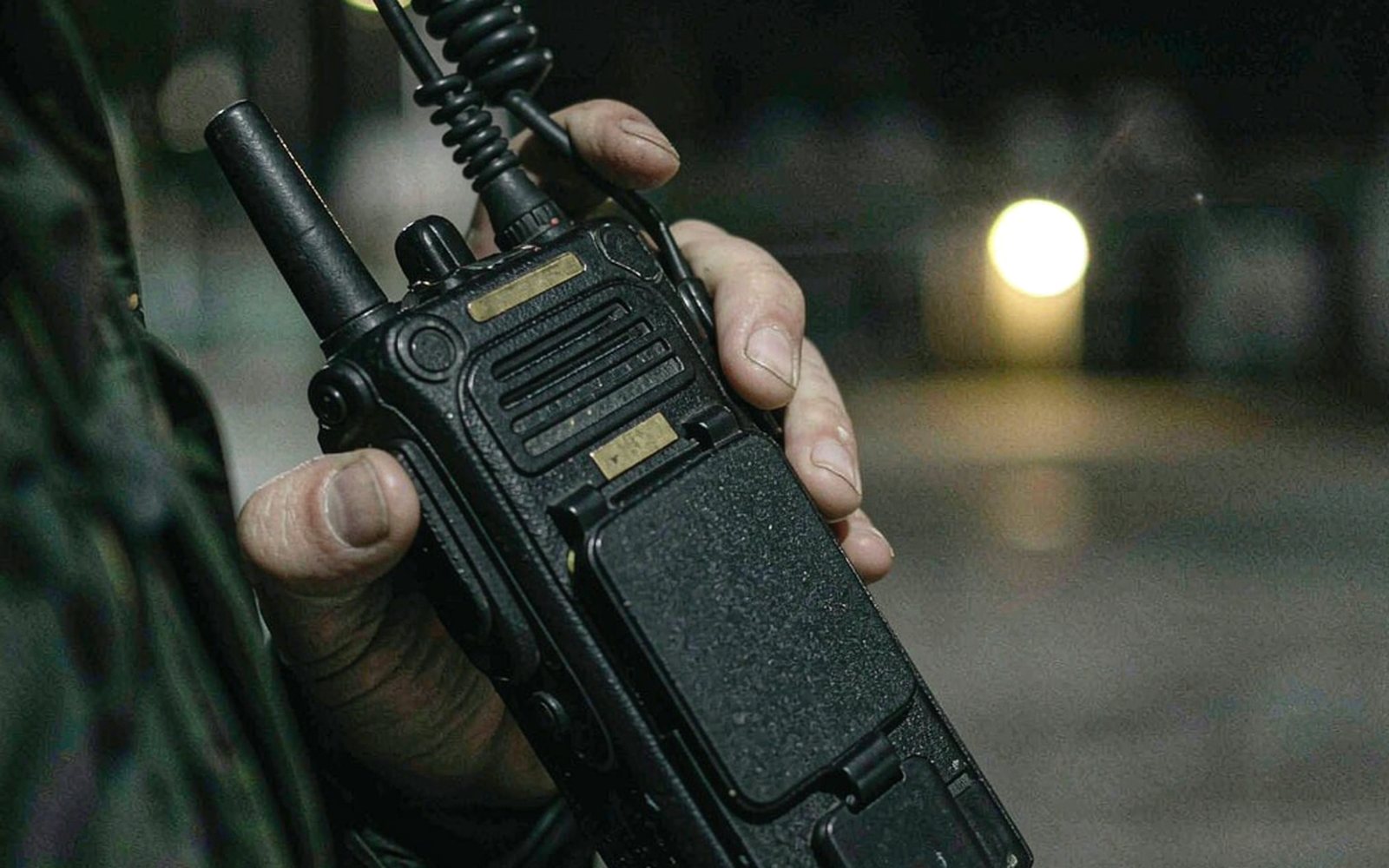 Two-way radio and earpiece used to keep a shift in contact